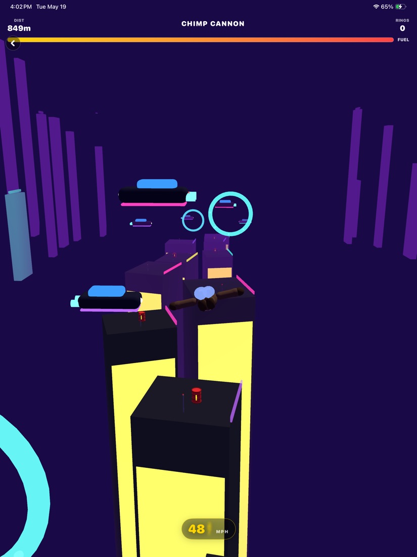 Chimp Cannon neon city level with rings and skyscrapers